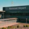 Hannover Airport building exterior on a clear day, showcasing modern architecture. - Hannover Airport building exterior on a clear day, showcasing modern architecture., tags: drohne flughafen - pexel
